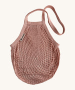 The Turtle Bags organic and fair trade cotton string bag for grocery shopping - in a blush pink colour