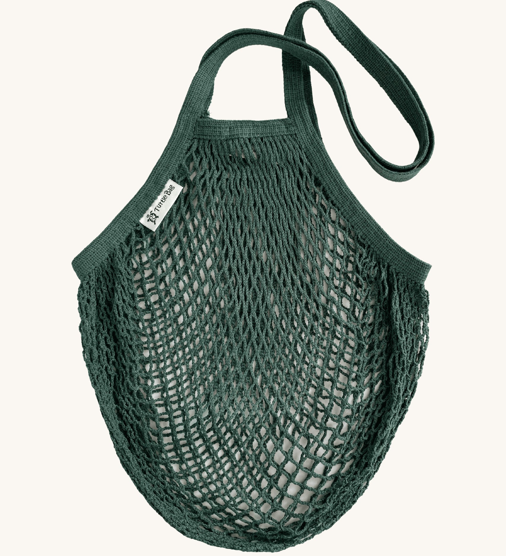 The Turtle Bags organic and fair trade cotton string bag for grocery shopping - in a bottle green colour