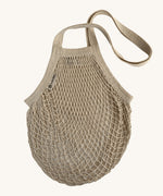 The Turtle Bags organic and fair trade cotton string bag for grocery shopping - in a natural beige colour