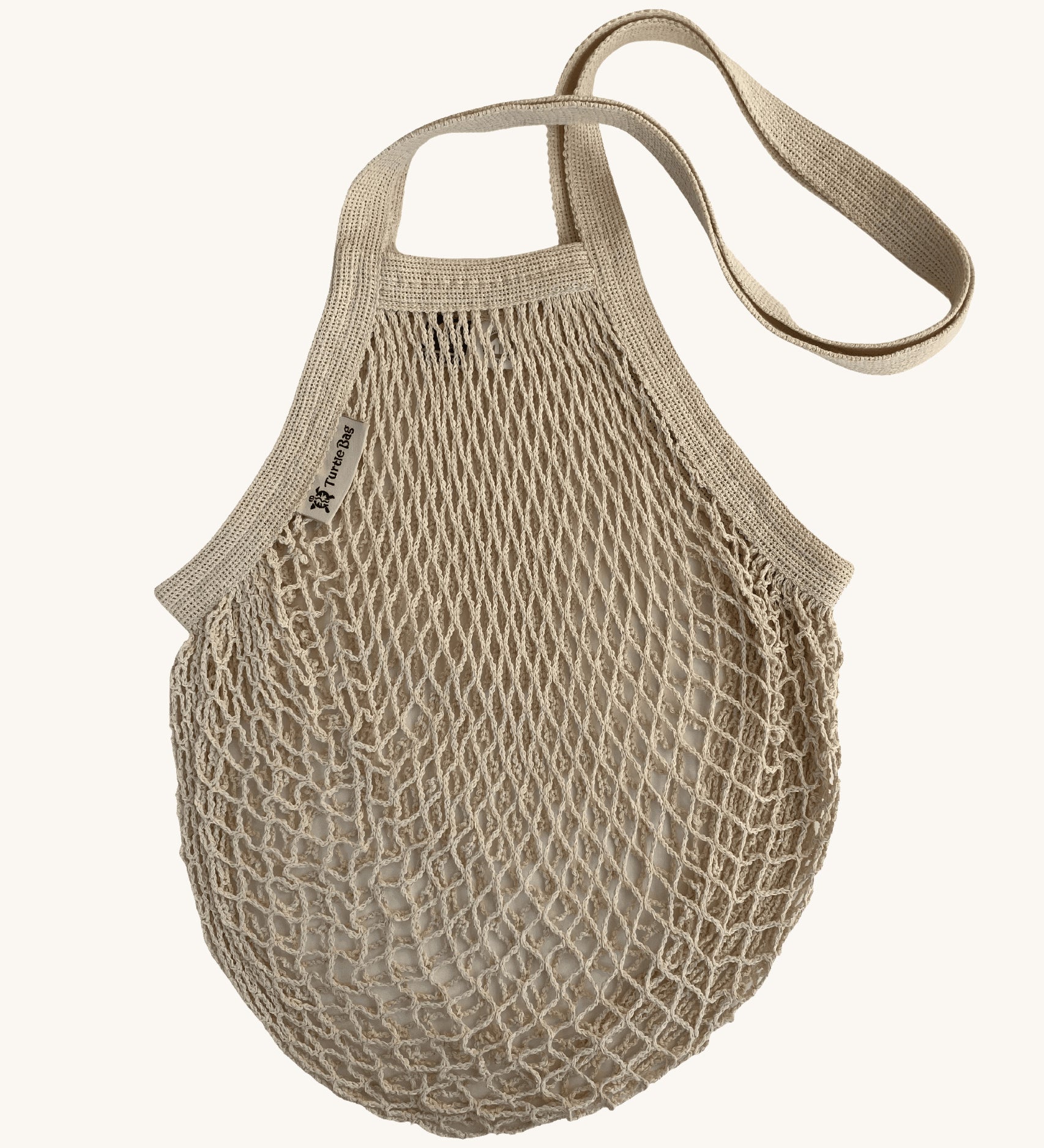 The Turtle Bags organic and fair trade cotton string bag for grocery shopping - in a natural beige colour