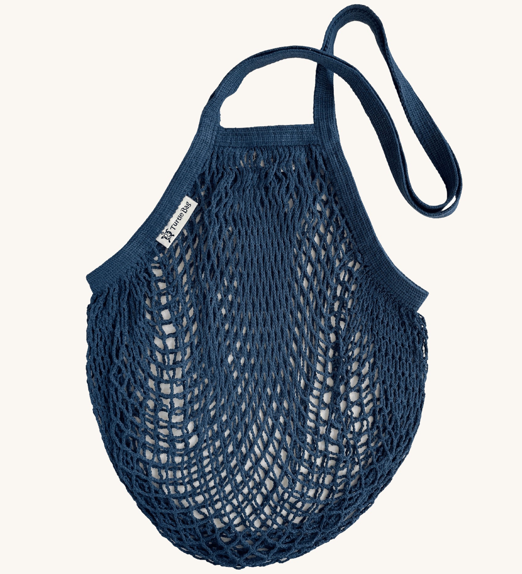 The Turtle Bags organic and fair trade cotton string bag for grocery shopping - in a petrol blue colour