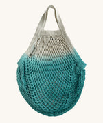 The Turtle Bags organic, fair trade cotton string grocery shopping reusable bag in dip dye turquoise