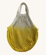 The Turtle Bags organic, fair trade cotton string grocery shopping reusable bag in dip dye yellow