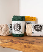 Four Turtle Bags organic cotton string grocery reusable shopping bags, in paper packaging. 