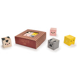 Uncle goose eco-friendly wooden farm cubelings blocks scattered on a white background next to their cardboard box