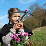 Child taking aim with the Vah Arabella Unicorn Wooden Crossbow with Arrows