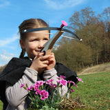 Child taking aim with the Vah Arabella Unicorn Wooden Crossbow with Arrows