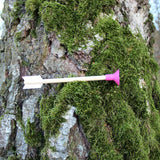 A crossbow safety arrow pictured on a tree