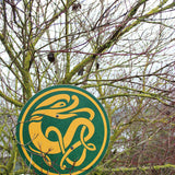 Vah Celtic Sigar Wooden Toy Shield placed on tree branches