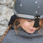 Child wearing the Vah Black Alamann Knight Helmet