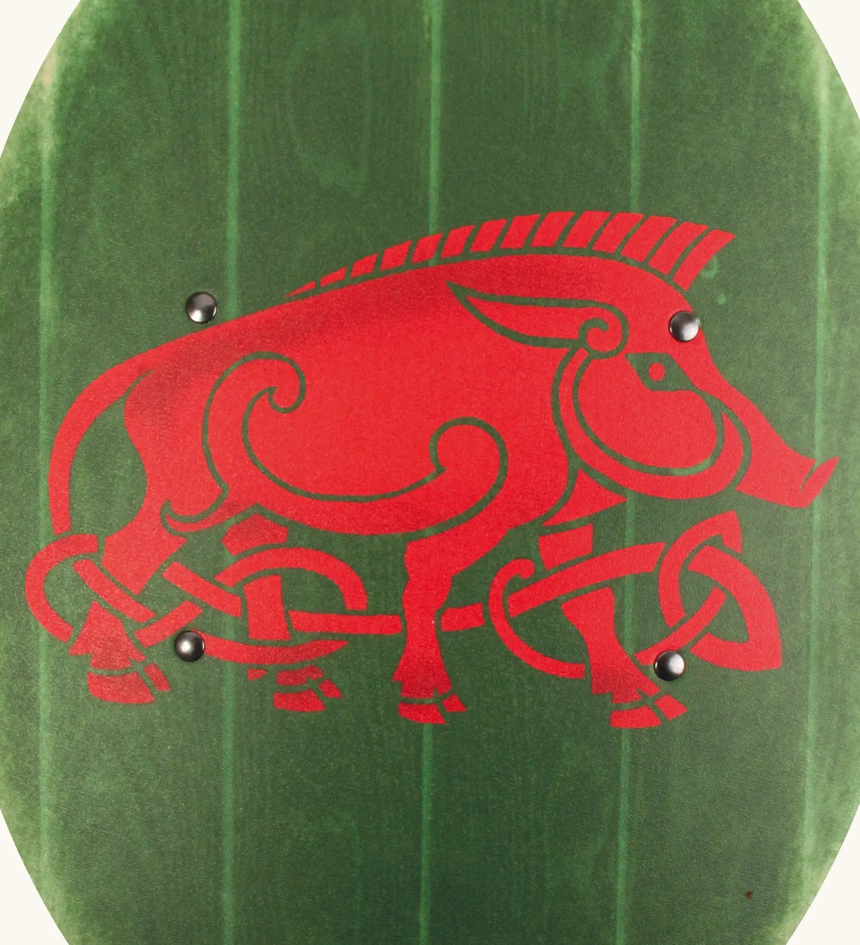 VAH green wooden curved shield showing a close up of a large Celtic warthog design in red on the front 