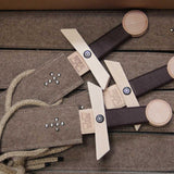 Three Vah Excalibur Wooden Sword Sets pictured on a pile of woolen felted  sheaths in a box