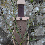Vah Excalibur Wooden Sword Set pictured outdoors with sword inside woolen felted  sheath