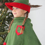 Child dressed up as robin hood wearing the vah robin hood cape and matching hat.