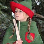 Child dressed up as robin hood wearing the vah robin hood cape and matching hat.