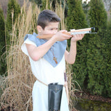 Child wearing the Vah Spartacus Roman Tunic using a crossbow