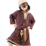 A child in full Viking costume including the Vah Viking Tunic, helmet and drinking horn. 