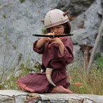 Child playing with the Vah Junior Wooden Bow toy