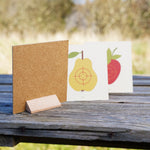Vah Wooden Fruit Target Trio for Safety Arrows. One target has been turned around to stand to show the wooden base that allows the targets to be freestanding. 