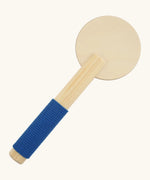 Vah wooden mini Tom traffic batton with a blue cord around the handle for grip