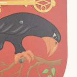 Illustration of a raven on the red Vah corvus wooden shield