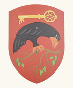 Vah wooden Corvus shield in red with a raven on a branch and yellow key