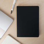 Vent for Change charcoal colour recycled leather lined notebook