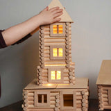 A tower built using pieces from the Walachia Vario XL Building Set 184 Pieces.  This modular wooden building block system is perfect for those who enjoy a challenge. The sets are available in various sizes at Babipur.  