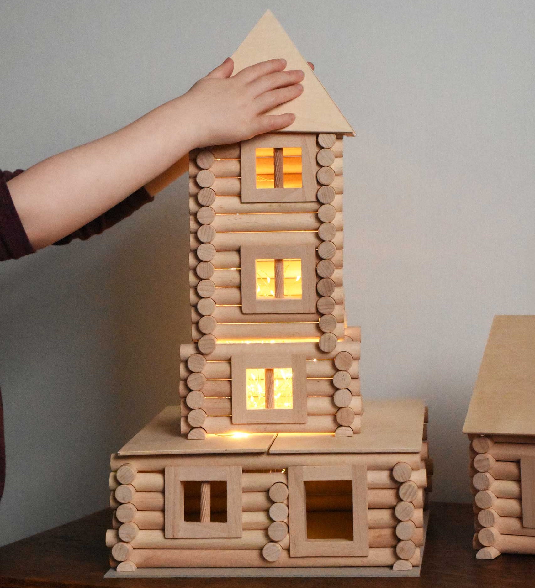 A tower built using pieces from the Walachia Vario XL Building Set 184 Pieces.  This modular wooden building block system is perfect for those who enjoy a challenge. The sets are available in various sizes at Babipur.  