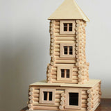 A tower built using pieces from the Walachia Vario XL Building Set 184 Pieces.  This modular wooden building block system is perfect for those who enjoy a challenge. The sets are available in various sizes at Babipur.  
