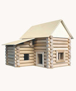 A log cabin type structure built using pieces from the Walachia Vario XL Building Set 184 Pieces.  This modular wooden building block system is perfect for those who enjoy a challenge. The sets are available in various sizes at Babipur.  