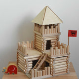 A fort build created using the Walachia Vario Fort Building Set 194 Pieces. A Babipur Lanka Kade elephant figure has been placed besides the build. This modular wooden building block system is perfect for those who enjoy a challenge. The sets are available in various sizes at Babipur. 