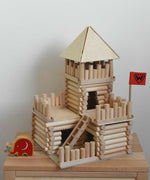 A fort build created using the Walachia Vario Fort Building Set 194 Pieces. A Babipur Lanka Kade elephant figure has been placed besides the build. This modular wooden building block system is perfect for those who enjoy a challenge. The sets are available in various sizes at Babipur. 