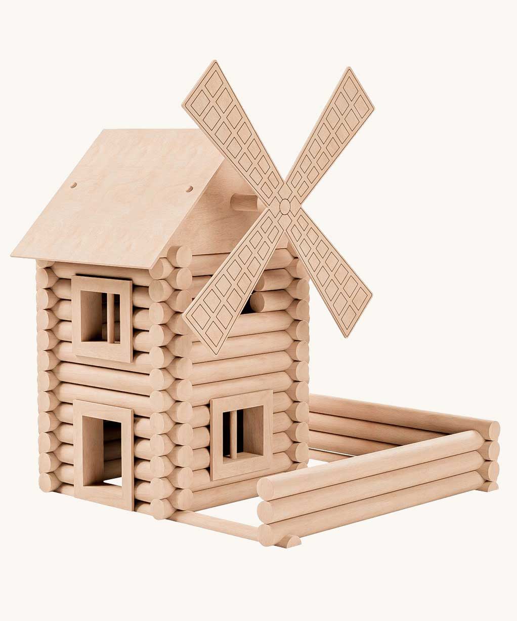 A wind mill built using the Walachia Vario Mill Wooden Building Set 122 Pieces. This modular wooden building block system is perfect for those who enjoy a challenge. The sets are available in various sizes at Babipur.  