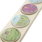 Close up of the Waldorf Family eco-friendly wooden maths coins in the Maths base on a white background