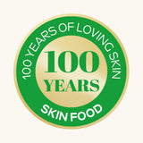 A green and gold  roundel showing 100 years of loving skin food from Weleda