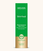 A green and gold limited edition box for the Weleda 100ml skin food tube