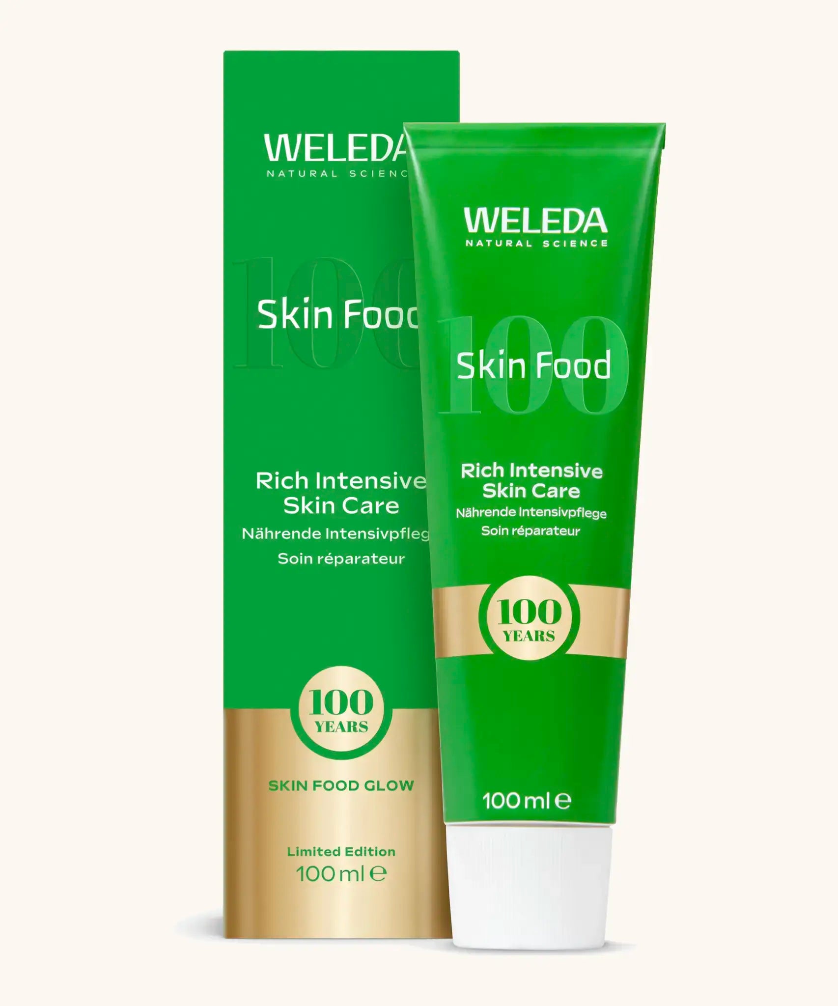 A green and gold limited edition Weleda skin food 100ml tube and box 