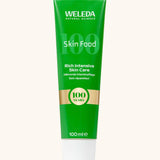 A limited edition 100 year celebratory green and gold tube of Weleda skin food in 100ml
