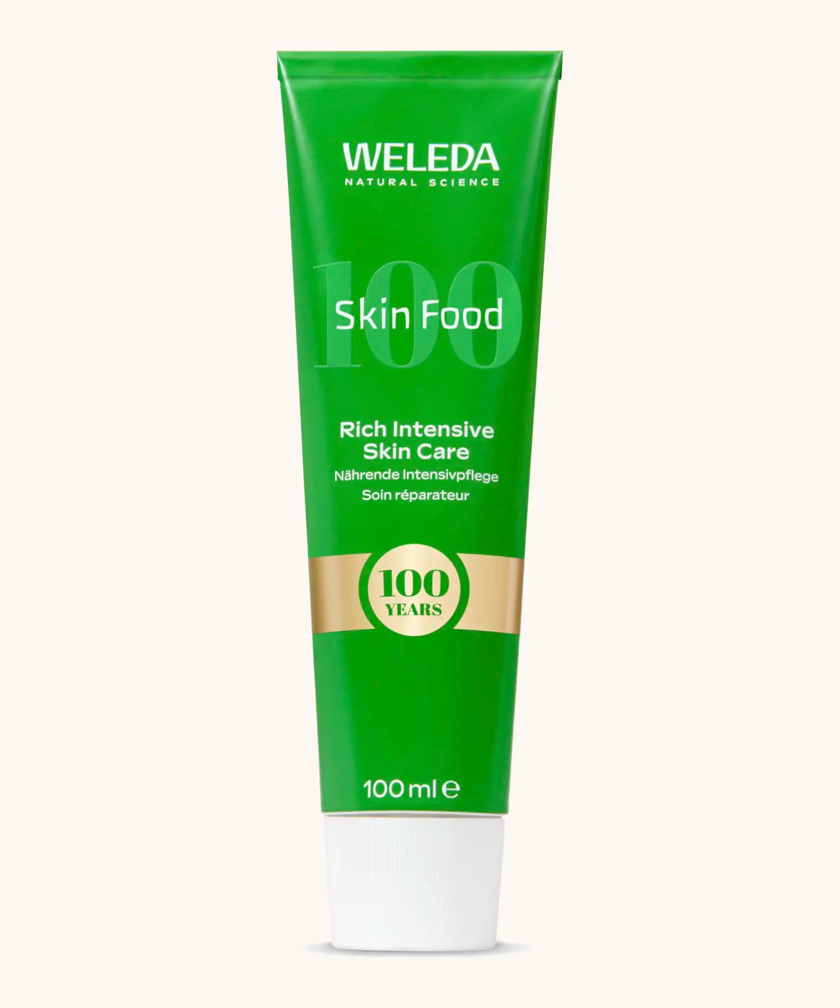 A limited edition 100 year celebratory green and gold tube of Weleda skin food in 100ml