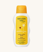 Weleda Baby Good Night Bath Soak in a white bottle, with yellow label highlighting 100% natural ingredients and organic calendula and lavender