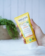 two yellow tubes of natural ginger shower gel with  Buy 1 Get 1 Half Price band