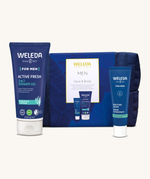 Weleda Men’s Face and Body Skincare Gift Set with natural and organic men’s skincare, showing the Active Fresh 3 in 1 Shower Gel, Men’s Moisture Cream, and navy reusable washbag arranged together.