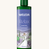 Weleda Relax Shower Cream Lavender 400ml bottle with watercolour illustration of a women in a lavender field on label.