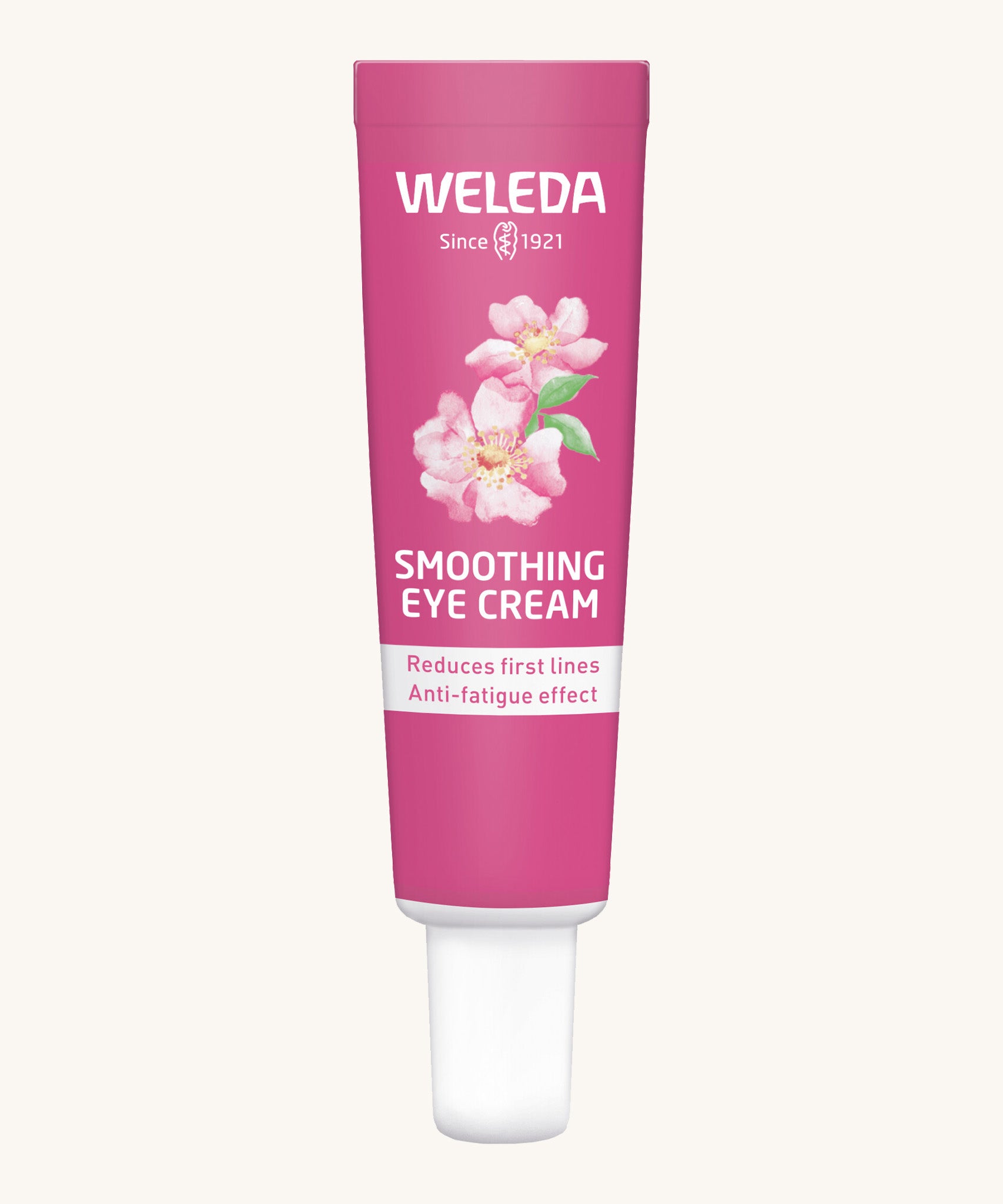 Weleda wild rose  and white tea soothing eye cream. Showing a pink tube with branding on the front and features a white cap.
