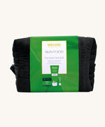Weleda Skin Food - The Face Care Edit Gift Set. A Weleda gift set that includes the Skin Food nourishing cleansing balm, lip balm and night cream, all presented in a make up bag. Weleda have a range of luxurious, natural skin care items available at Babipur. 