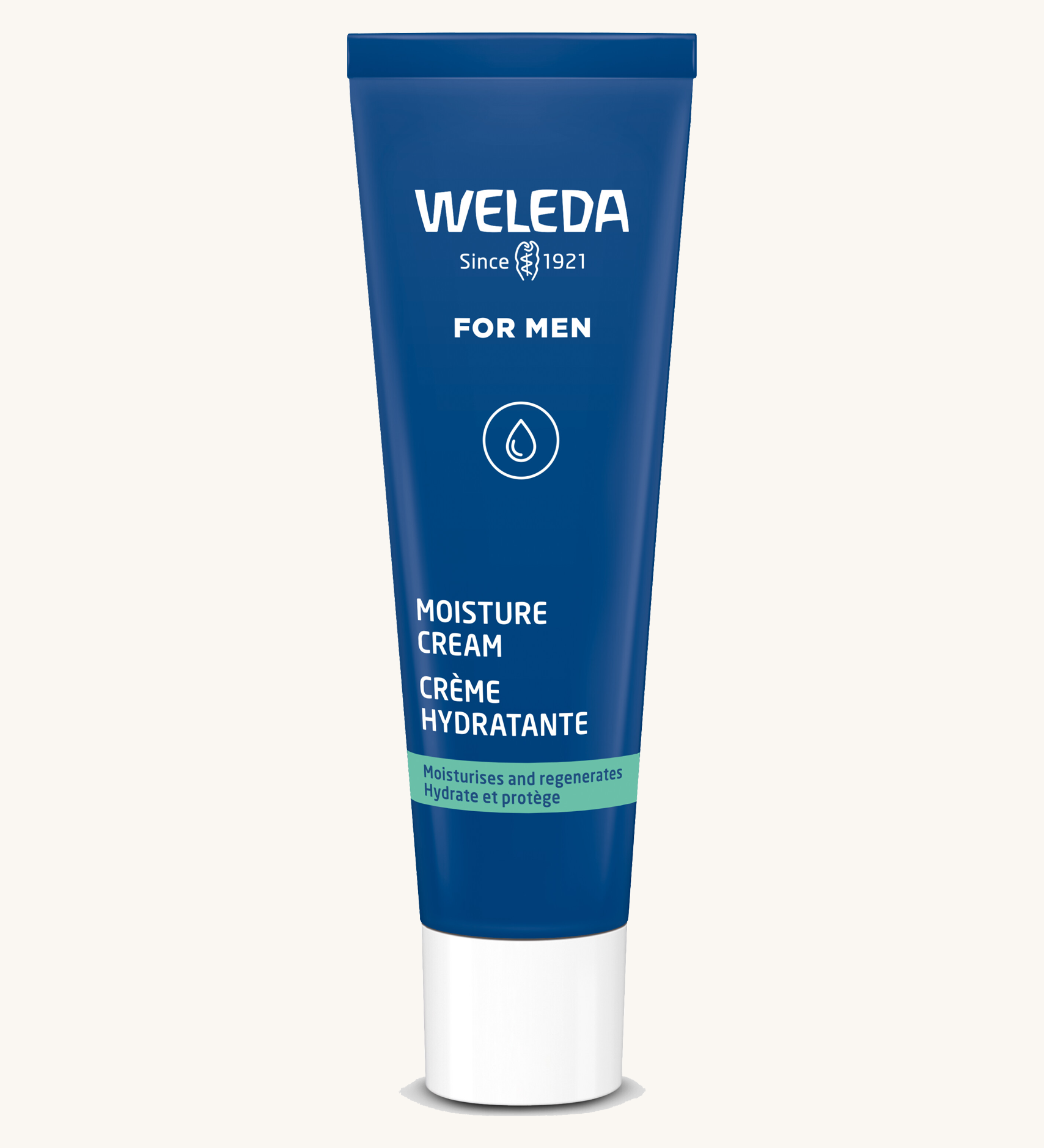 Blue tube of Weleda Men’s Moisture Cream standing upright on a light background.