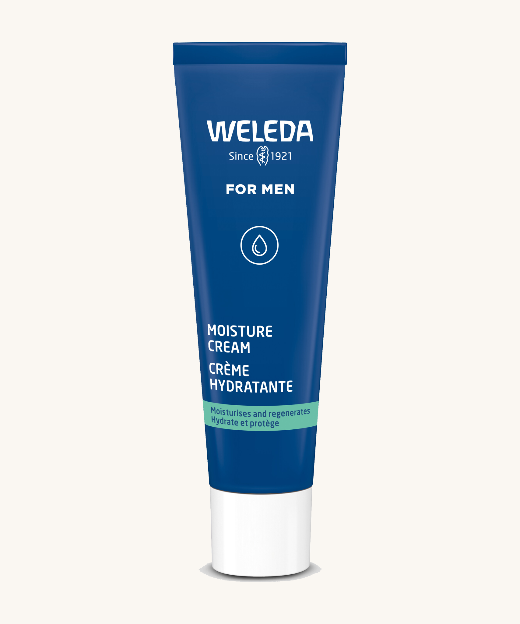 Blue tube of Weleda Men’s Moisture Cream standing upright on a light background.