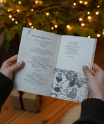 A person holding open the Where The Forest Once Stood - Children's Poetry Anthology by Julie Hare book open. This book is part of a range of children's books available at Babipur. 