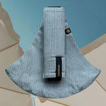Wildride toddler carrier in denim stripe. A 100% cotton seat stylish hip carrier for babies in thin blue and white stripes 